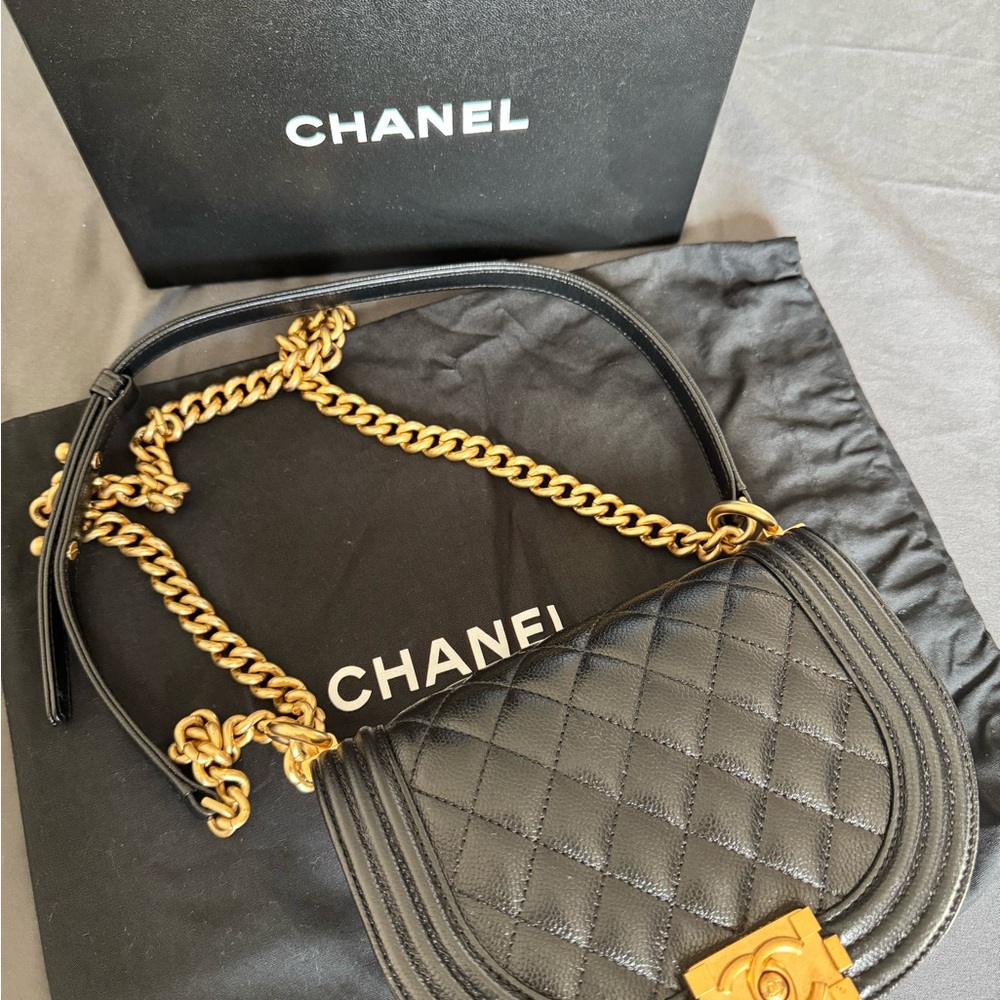 Chanel Quilted Black Bag with Gold Chain Accent